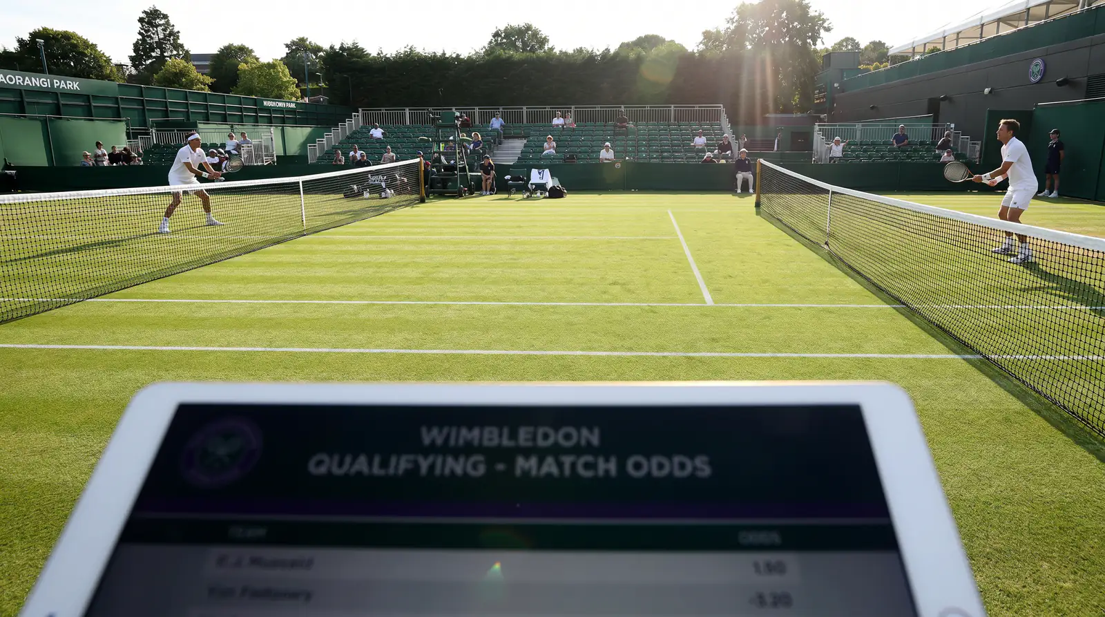 Wimbledon qualifying match in progress at Aorangi Park between lower-ranked players
